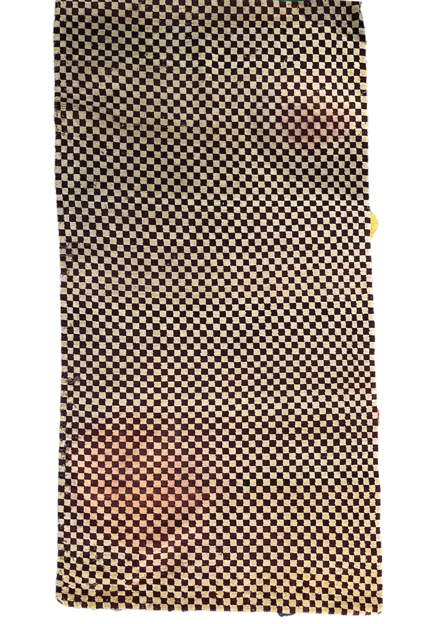 An antique Tibetan checkerboard handmade wool rug