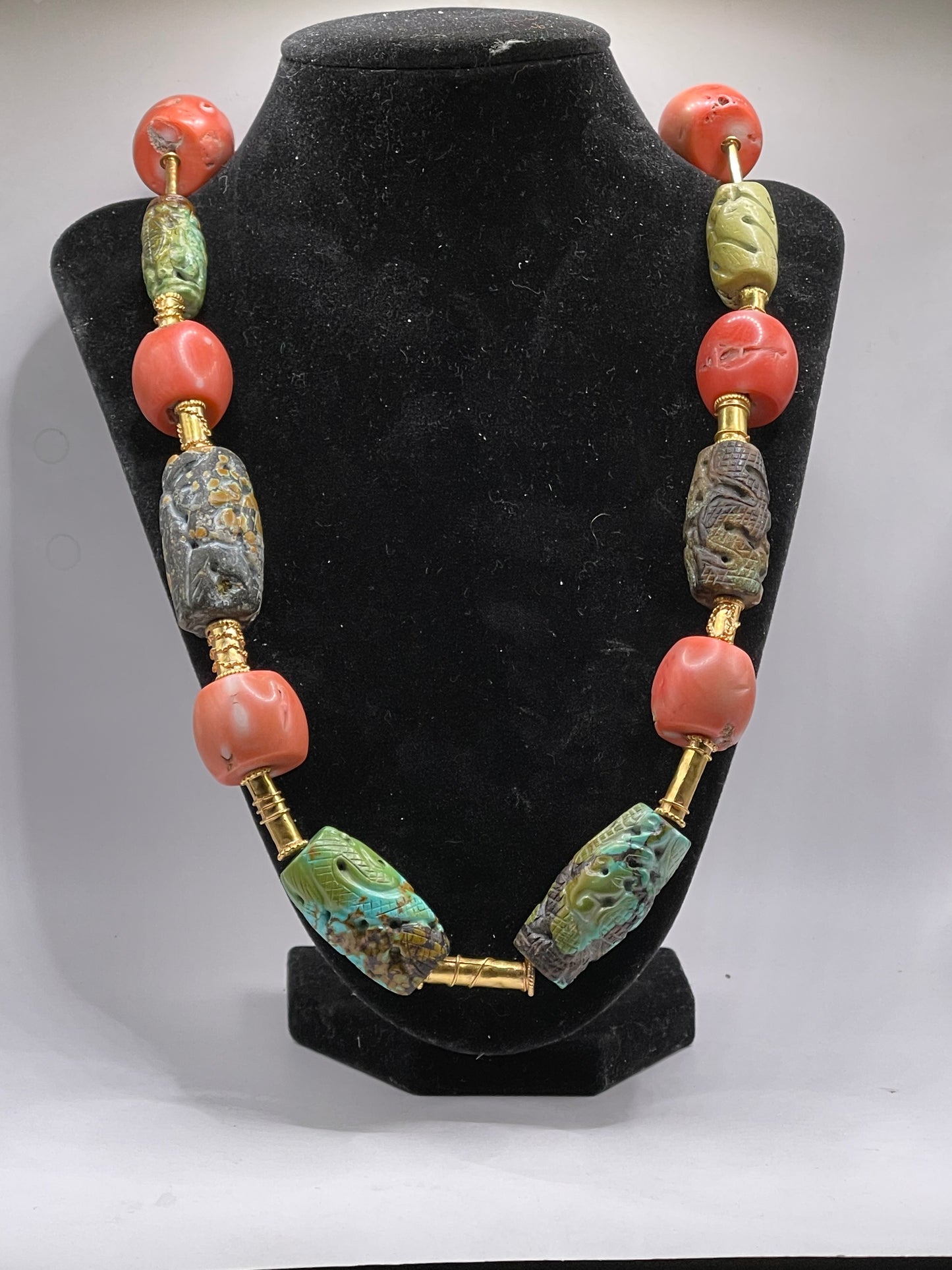 A necklace with vintage carved beads