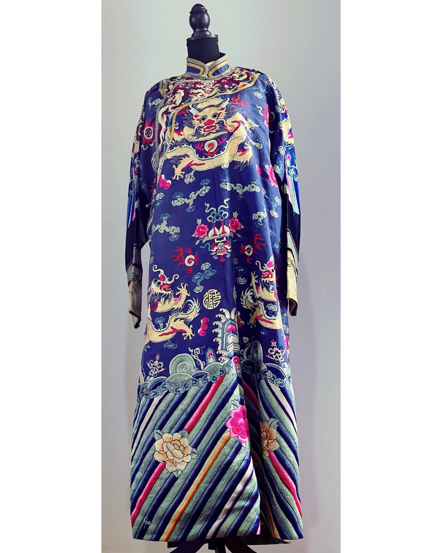 An antique blue silk embroidered dragon robe