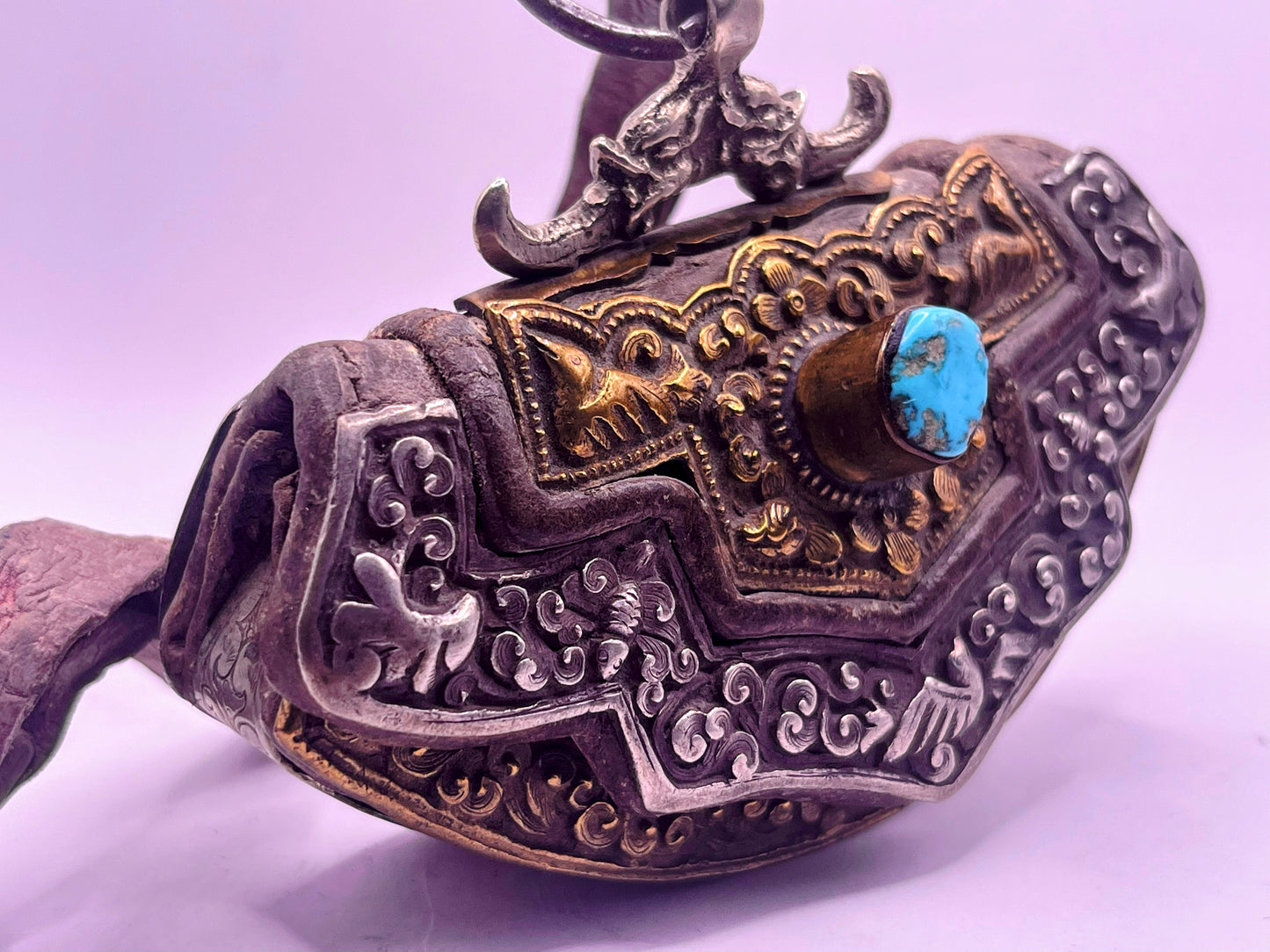 An antique Tibetan mechak purse with turquoise