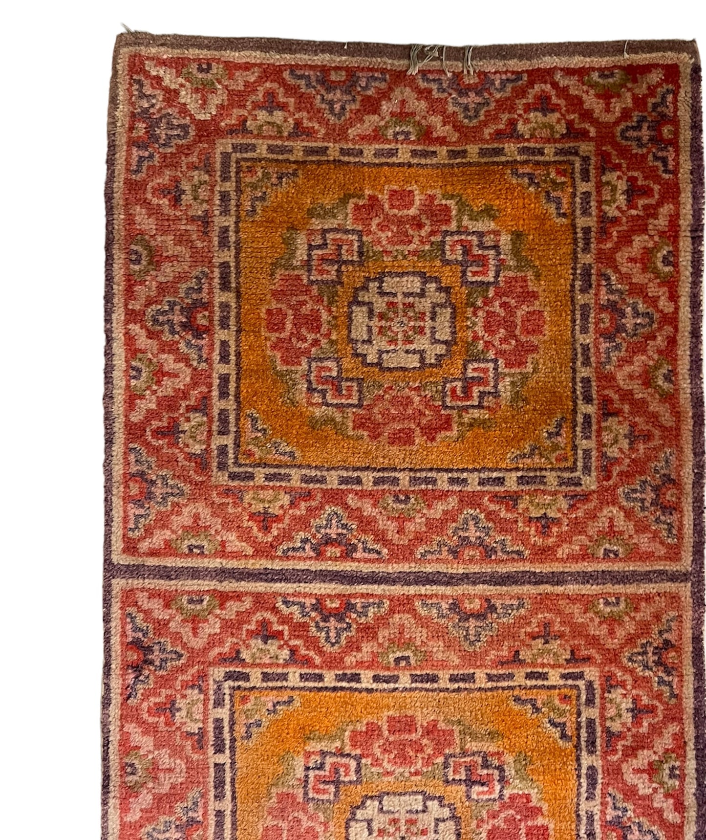 An antique triple seater Tibetan meditation rug