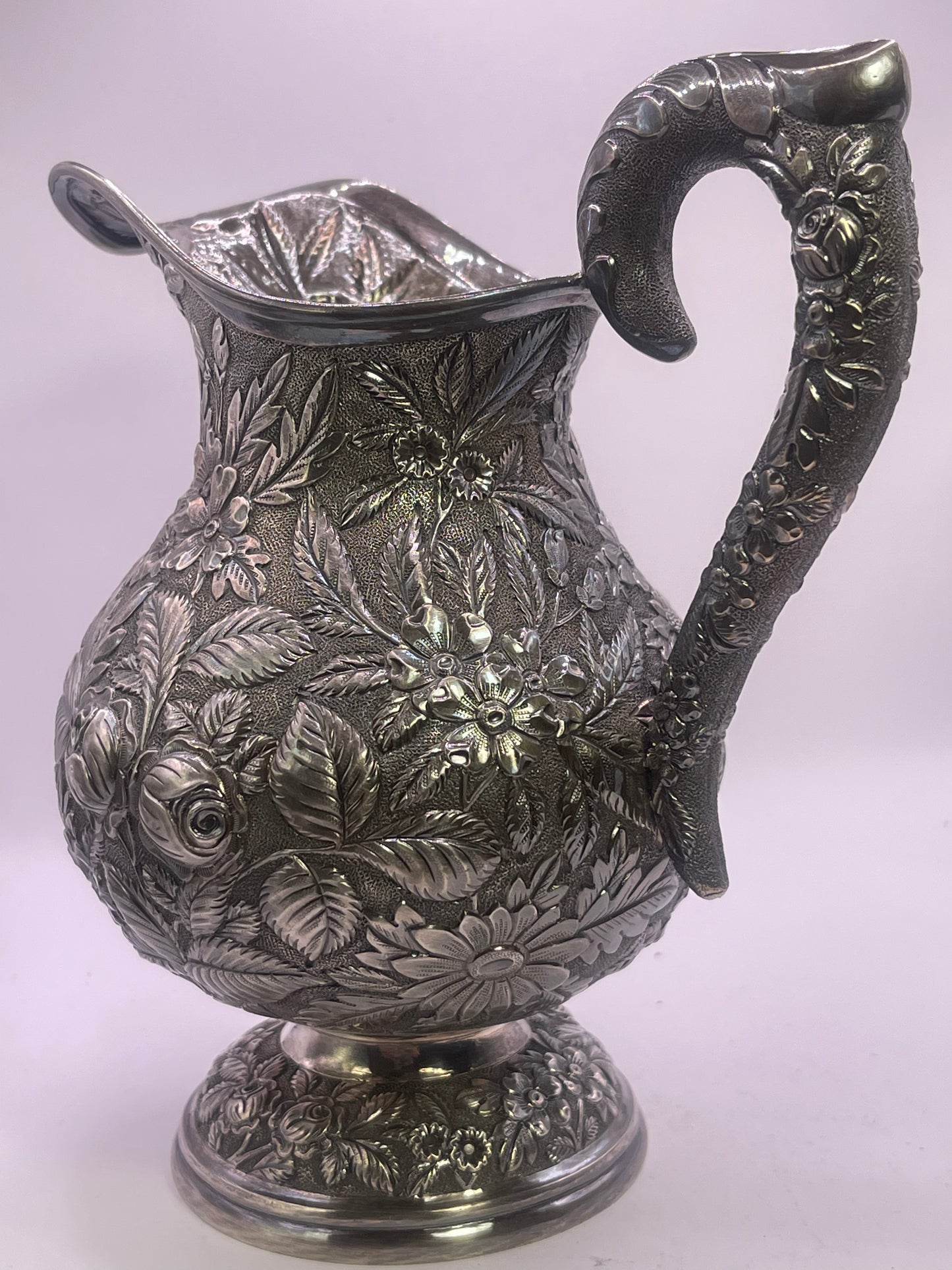 Early 20th C., antique hand chased pitcher