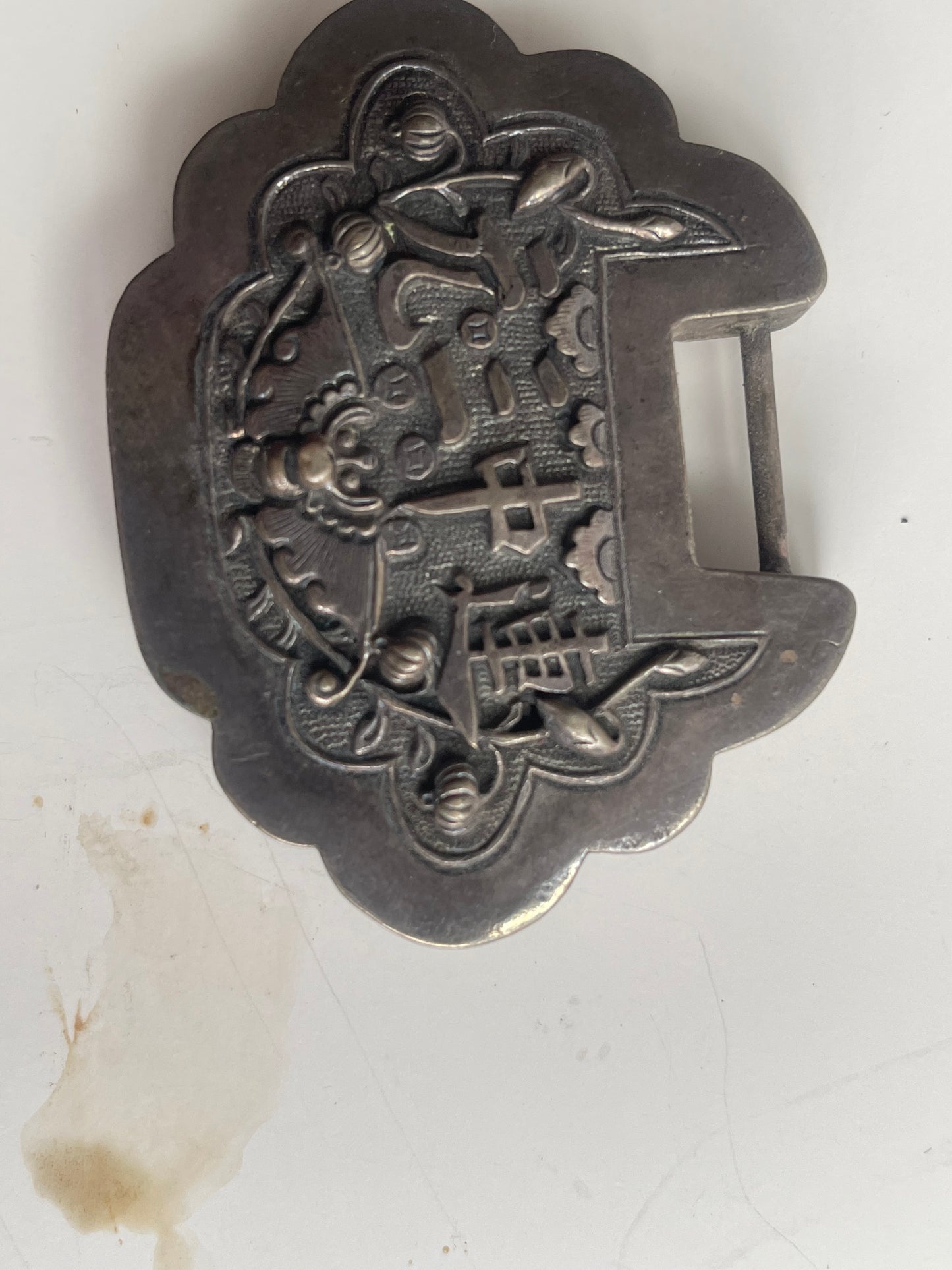 An antique Mongolian silver spirit lock