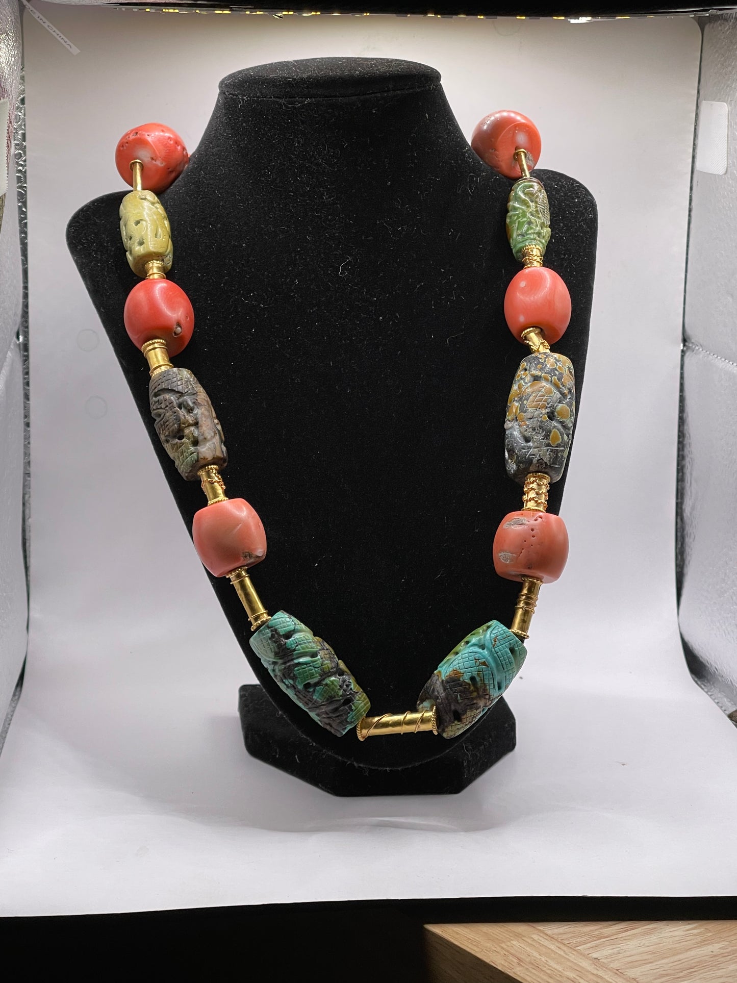 A necklace with vintage carved beads