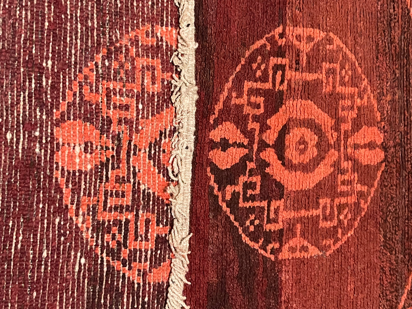 An antique Tibetan rug with coin motifs