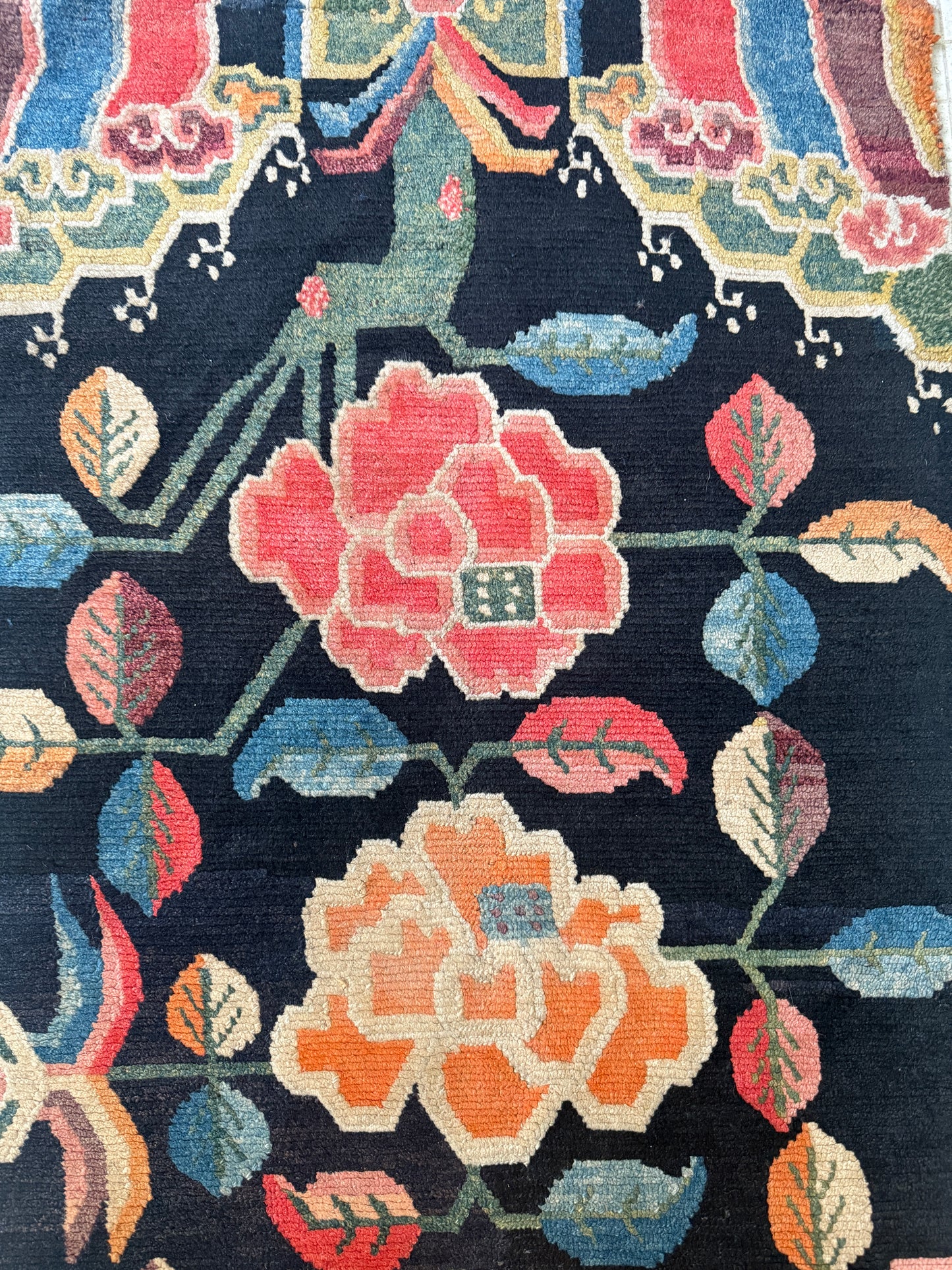 An early 20th C., antique Tibetan floral  rug