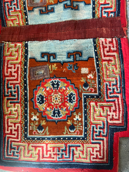 An antique Tibetan saddle rug