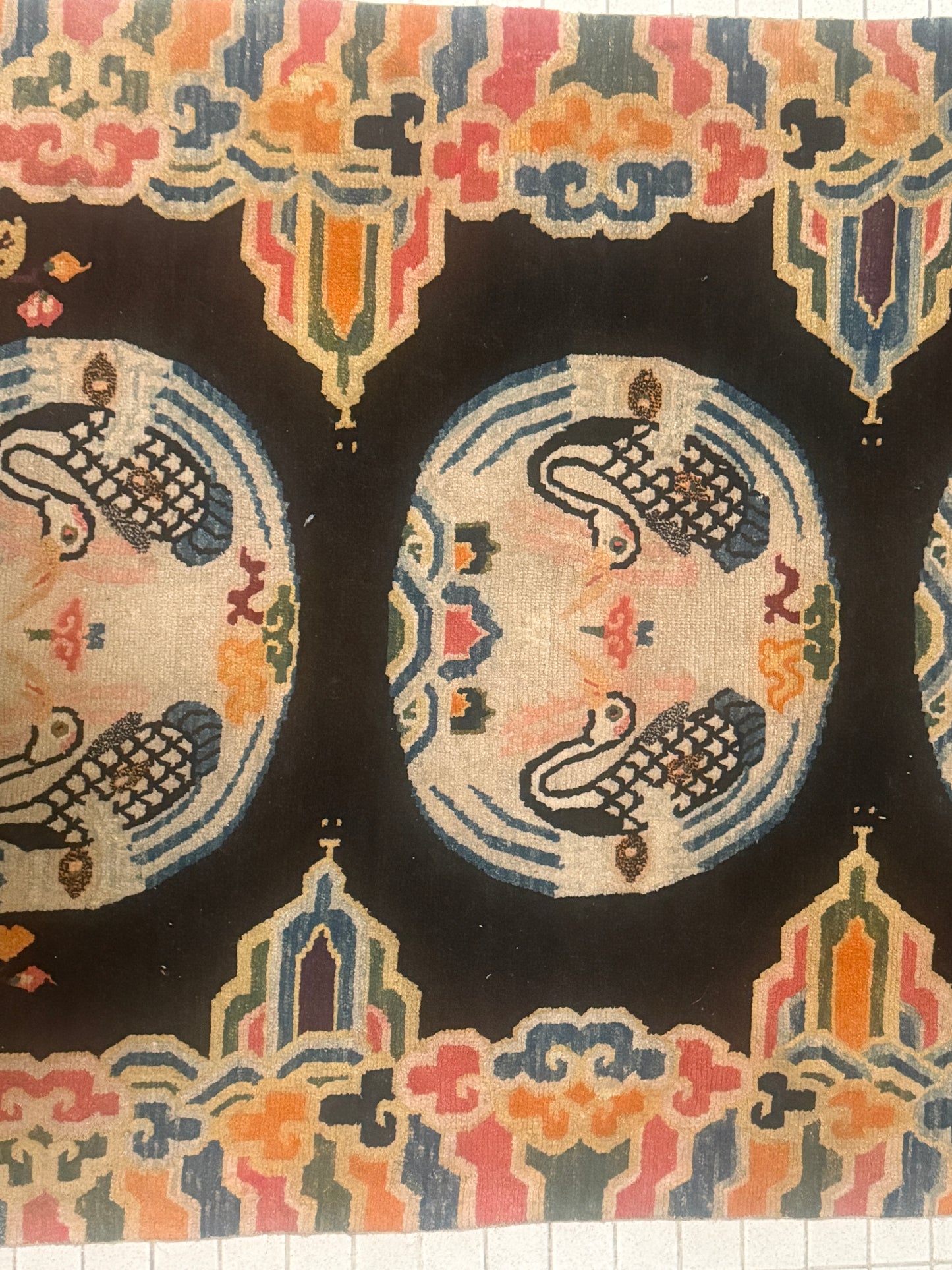 An antique early 20th c., Tibetan rug