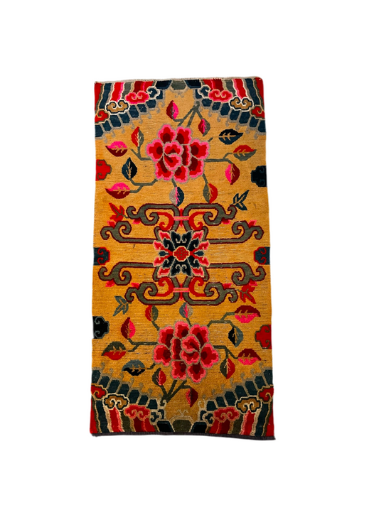 An early 20th C., antique Tibetan floral  rug