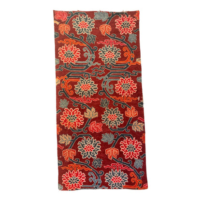 An early to mid 20th C., antique Tibetan floral rug