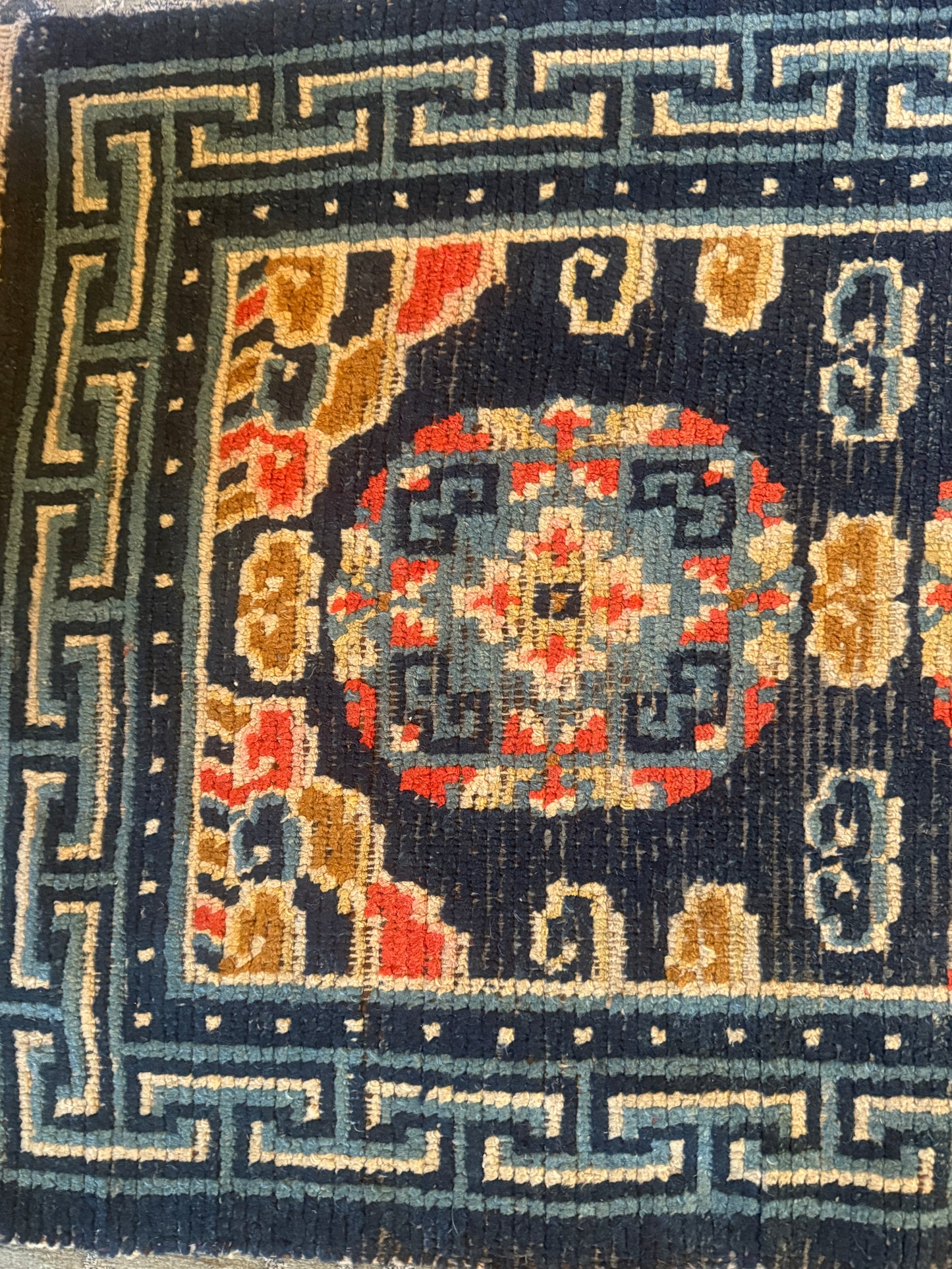 Antique 19th Century navy blue Tibetan woolen rug