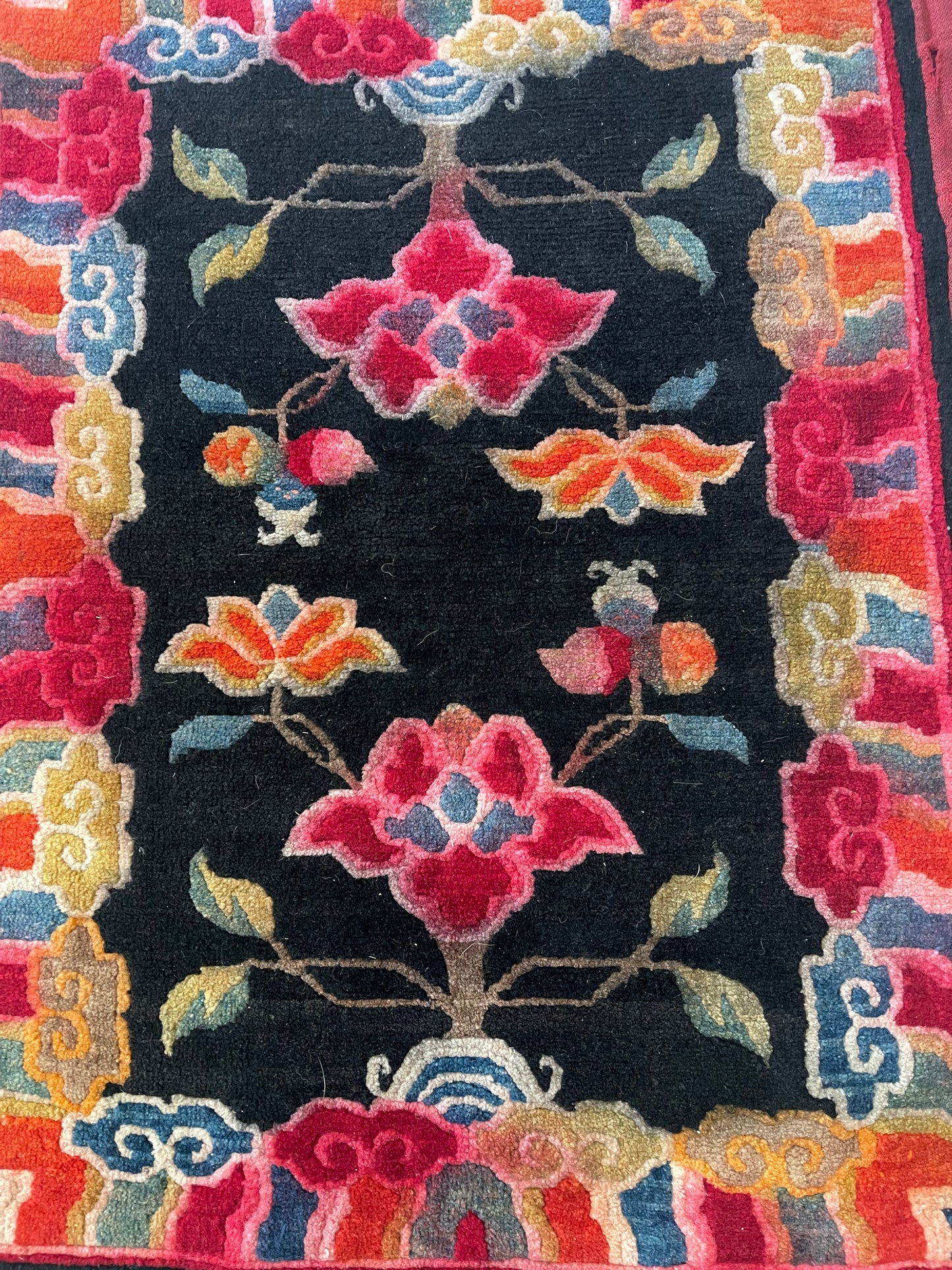 An early 20th C., antique Tibetan floral  cushion rug