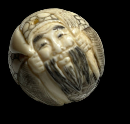 Two antique Japanese bone ojime beads