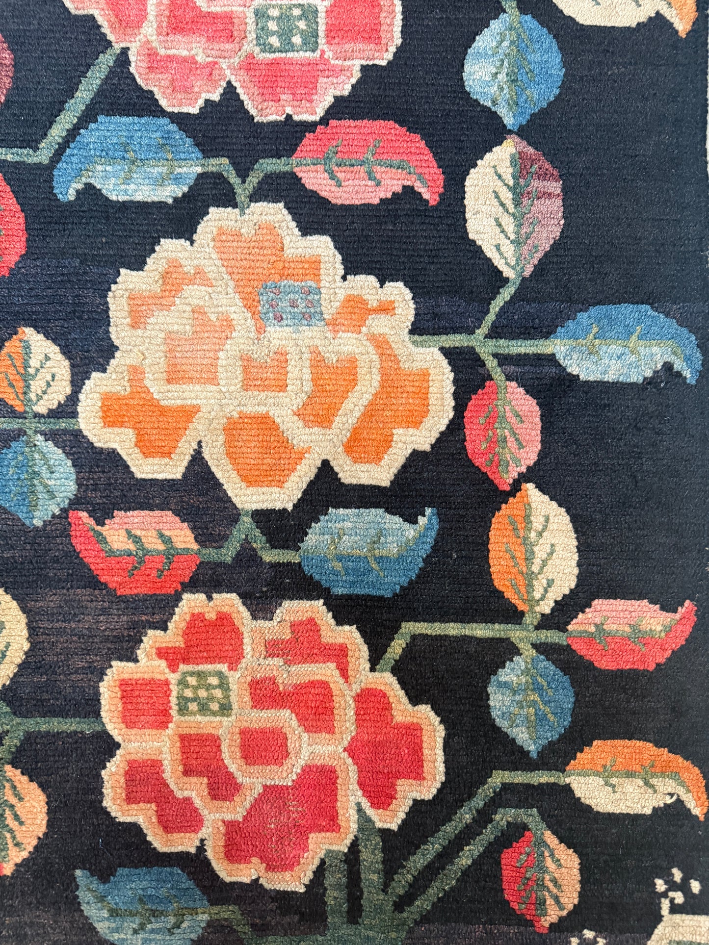 An early 20th C., antique Tibetan floral  rug