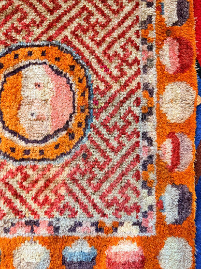 Antique meditation seat rug with unique circular motifs