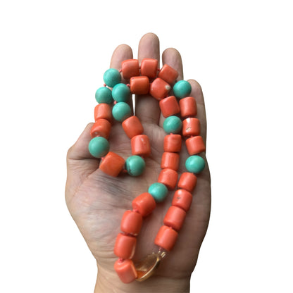 A coral and turquoise bead necklace
