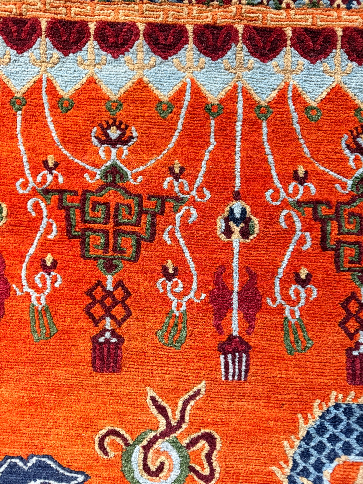 A vintage Tibetan dragon door rug