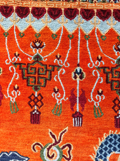 A vintage Tibetan dragon door rug