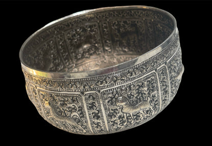 An antique south East Asian silver repousse bowl