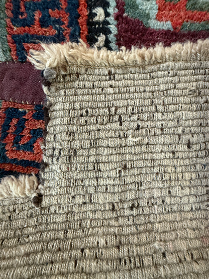 Antique Tibetan saddle rug