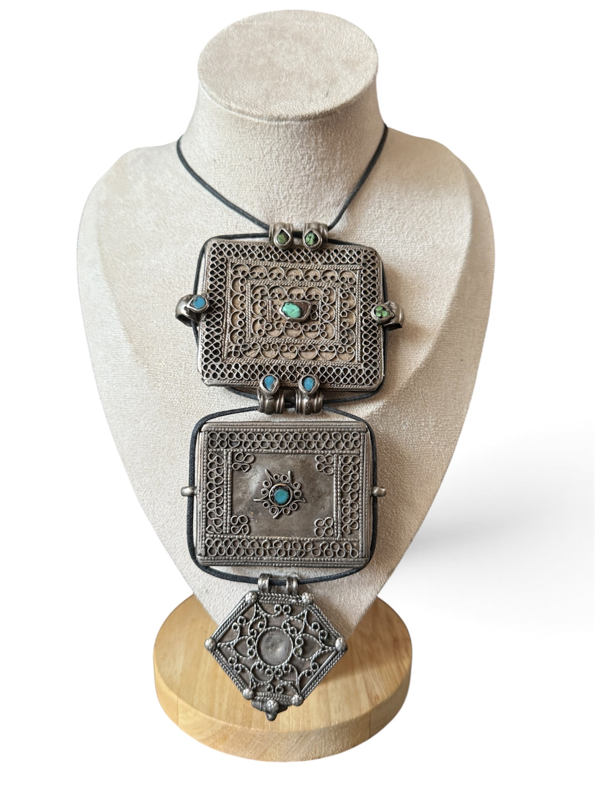 A set of three antique silver amulet boxes