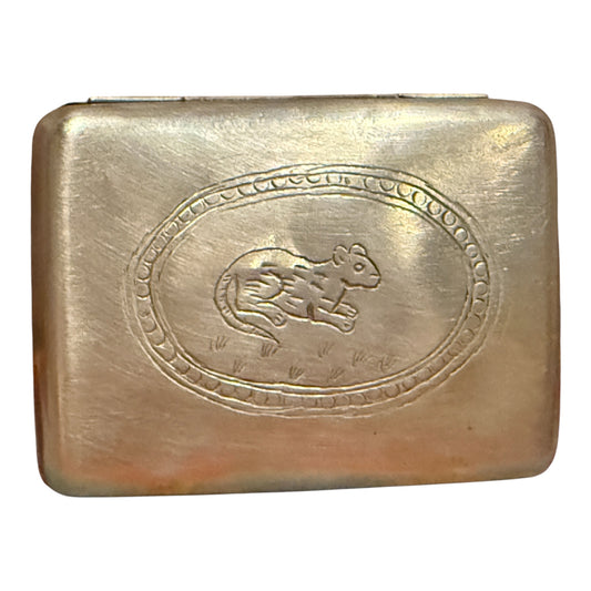 A silver box with hinged lid