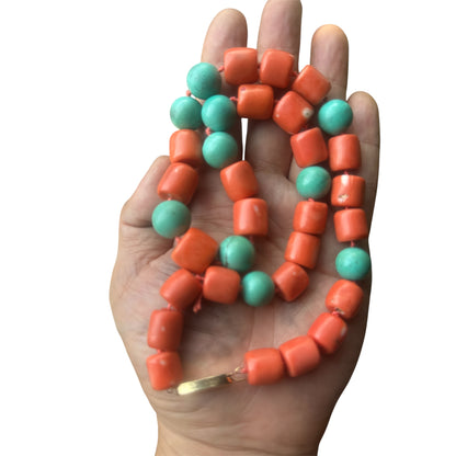 A coral and turquoise bead necklace