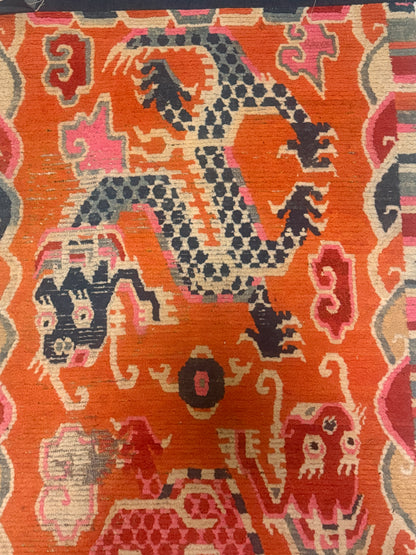 A 19th C., unique antique Tibetan dragon rug