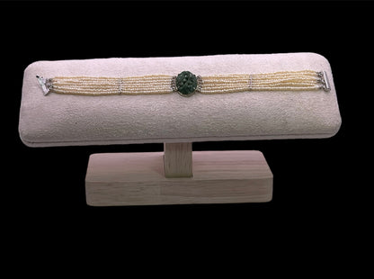 an antique seed pearl and jade plaque bracelet