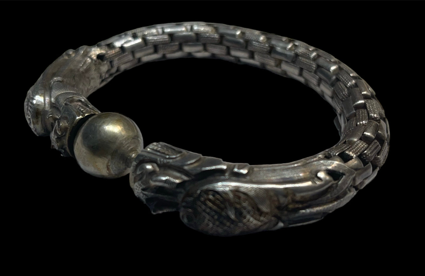 An antique double dragon with pearl silver link bracelet