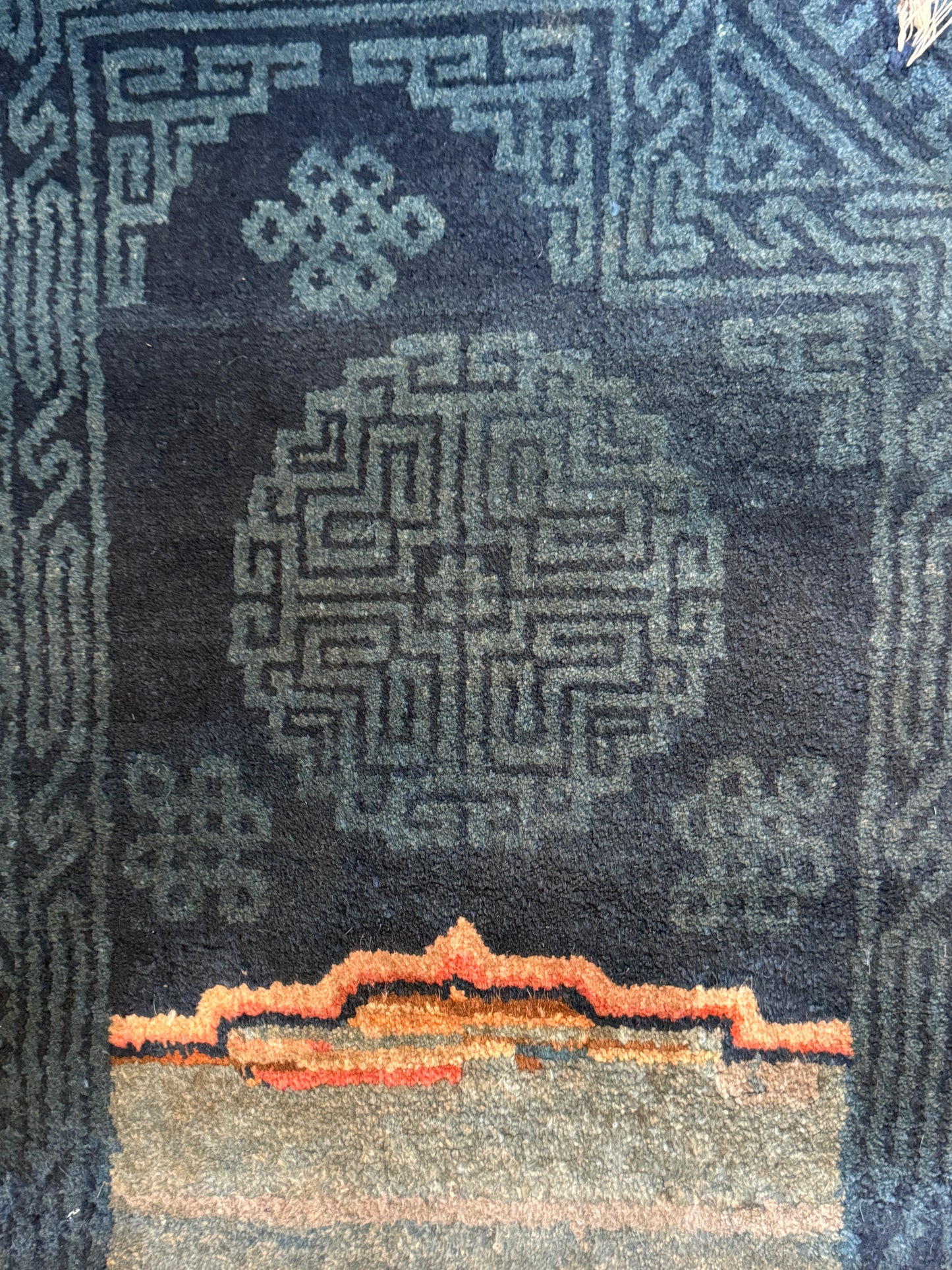 A vintage indigo Tibetan saddle rug