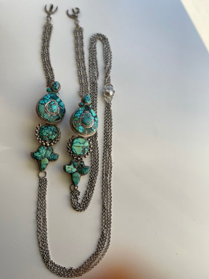 A pair of antique Tibetan earrings -aykhor