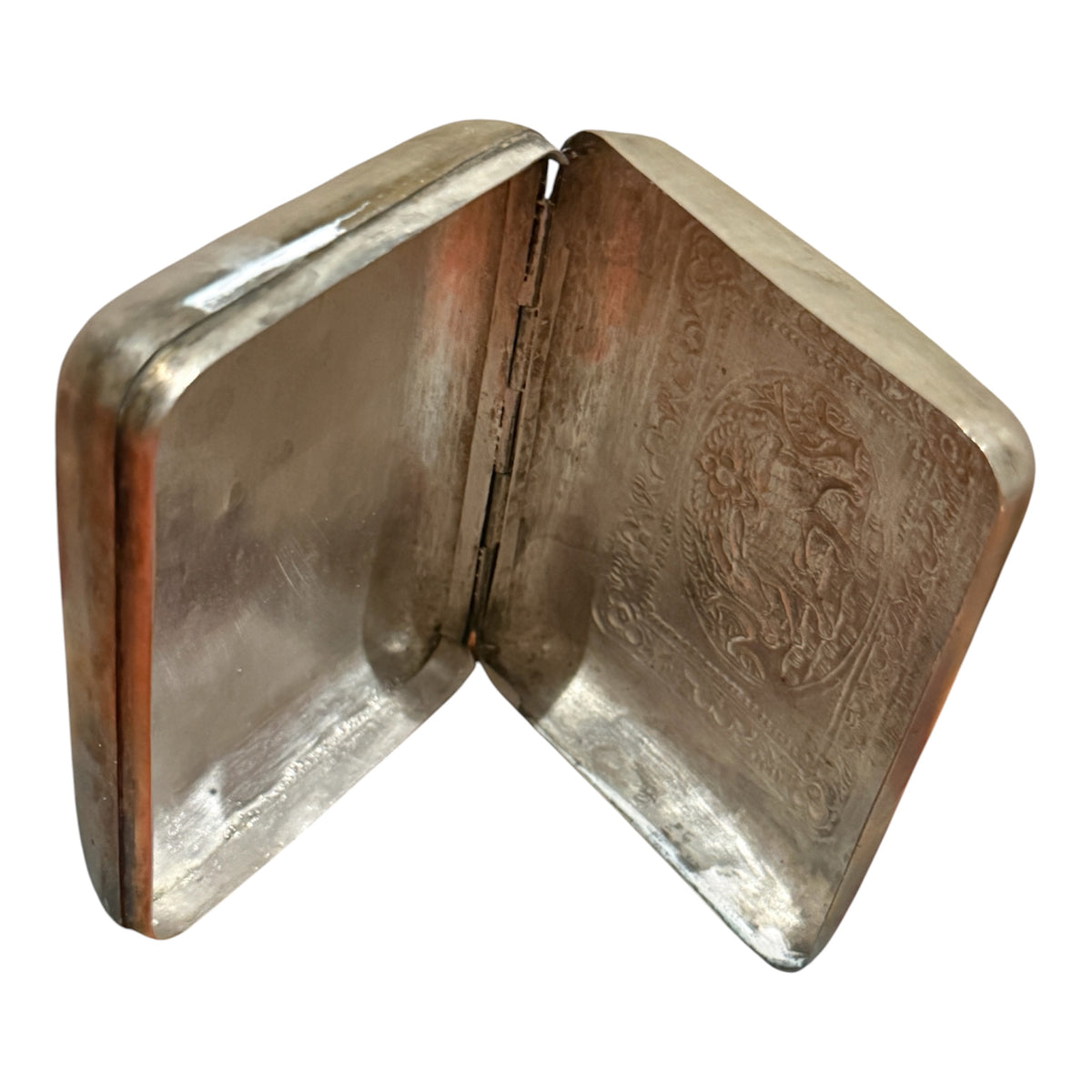 A silver box with hinged lid