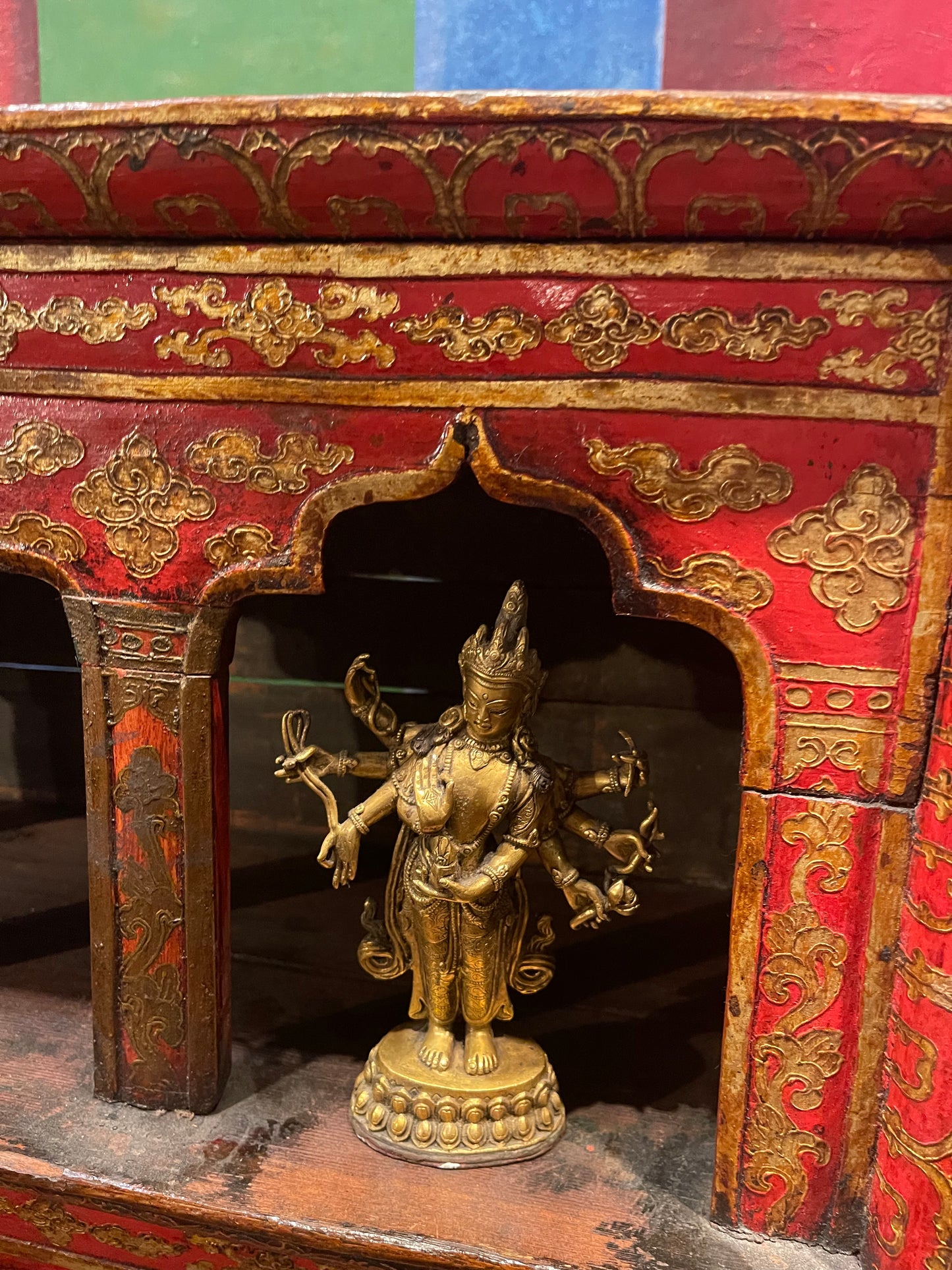 An antique late 19th. c. Tibetan shrine cabinet