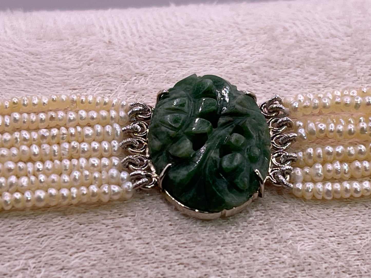 an antique seed pearl and jade plaque bracelet