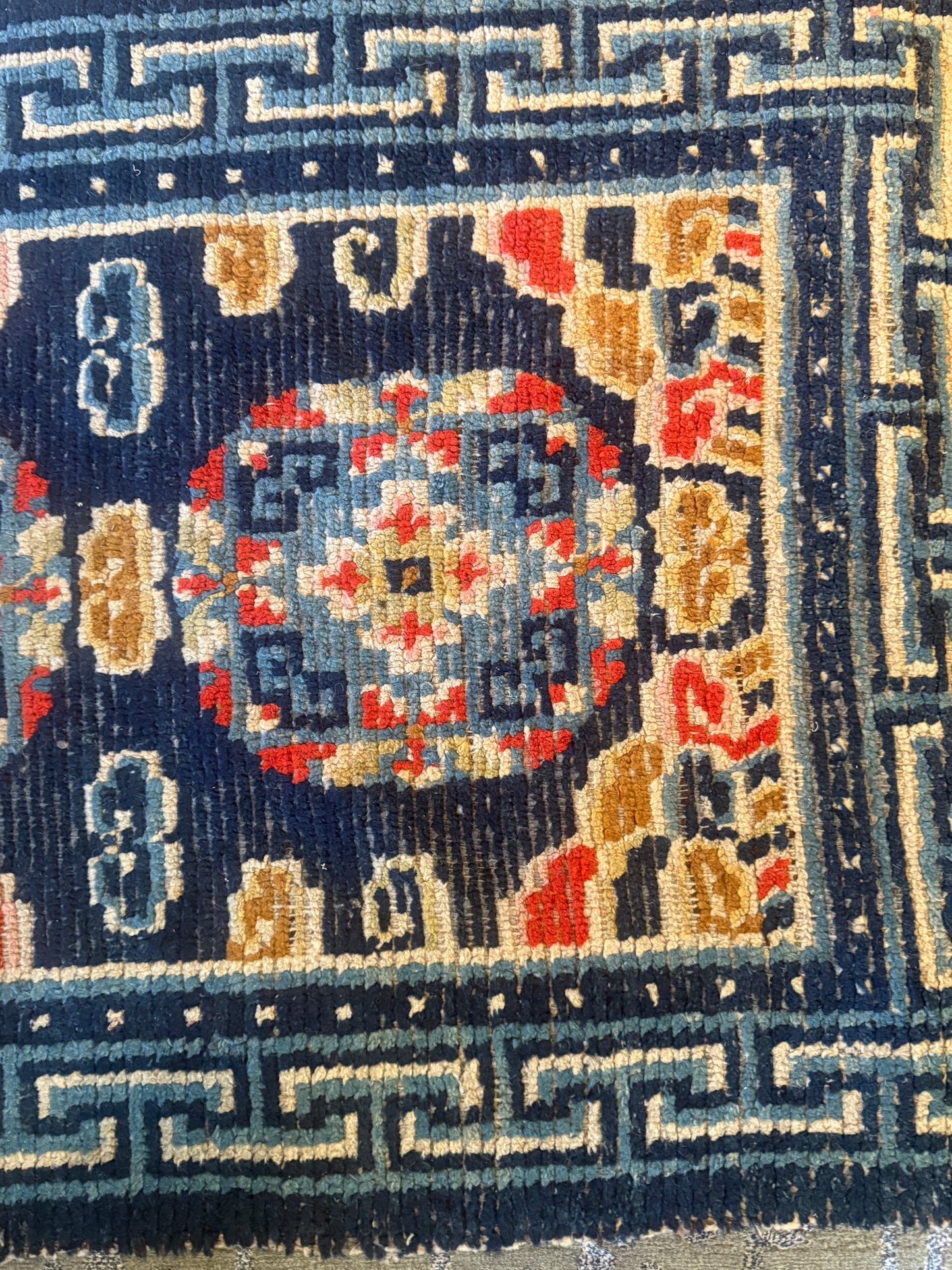 Antique 19th Century navy blue Tibetan woolen rug