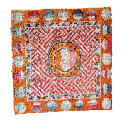 Antique meditation seat rug with unique circular motifs