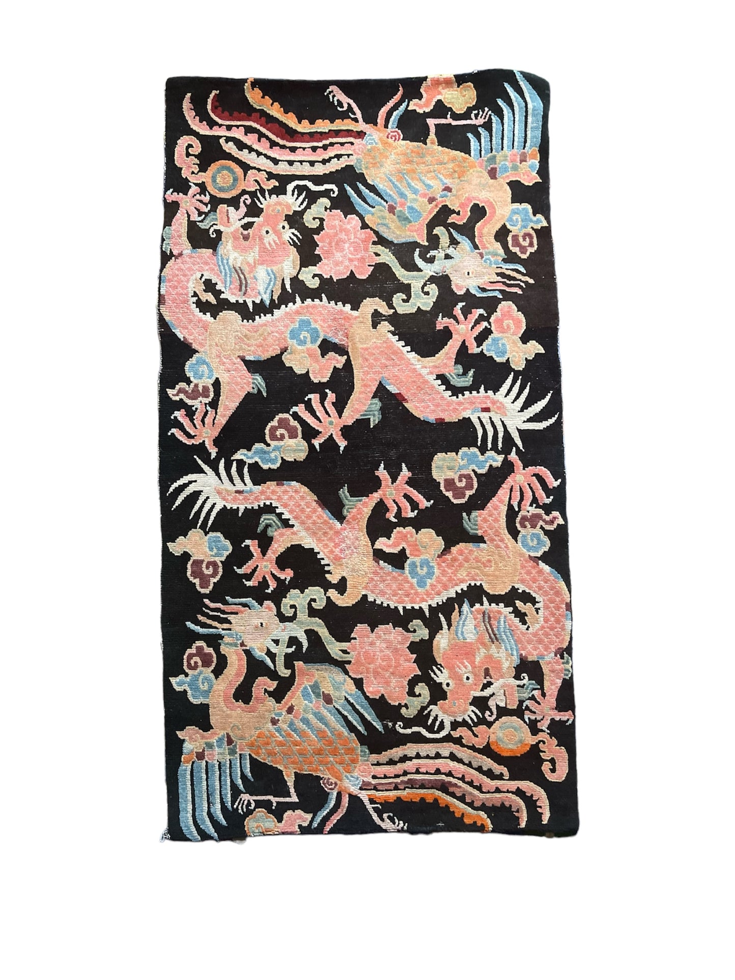A mid 20th C., Tibetan dragon and phoenix rug