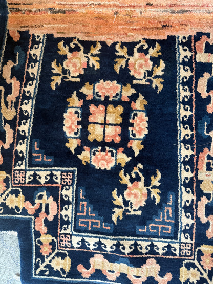 A vintage indigo saddle rug