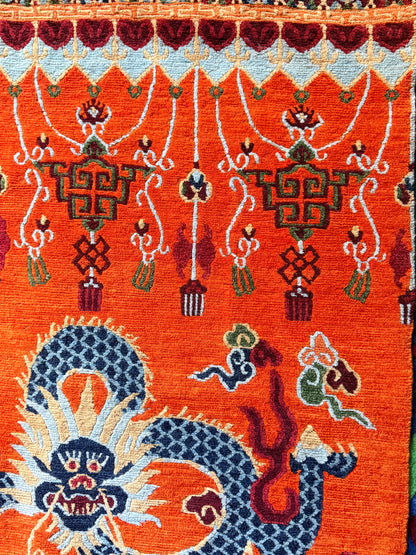 A vintage Tibetan dragon door rug