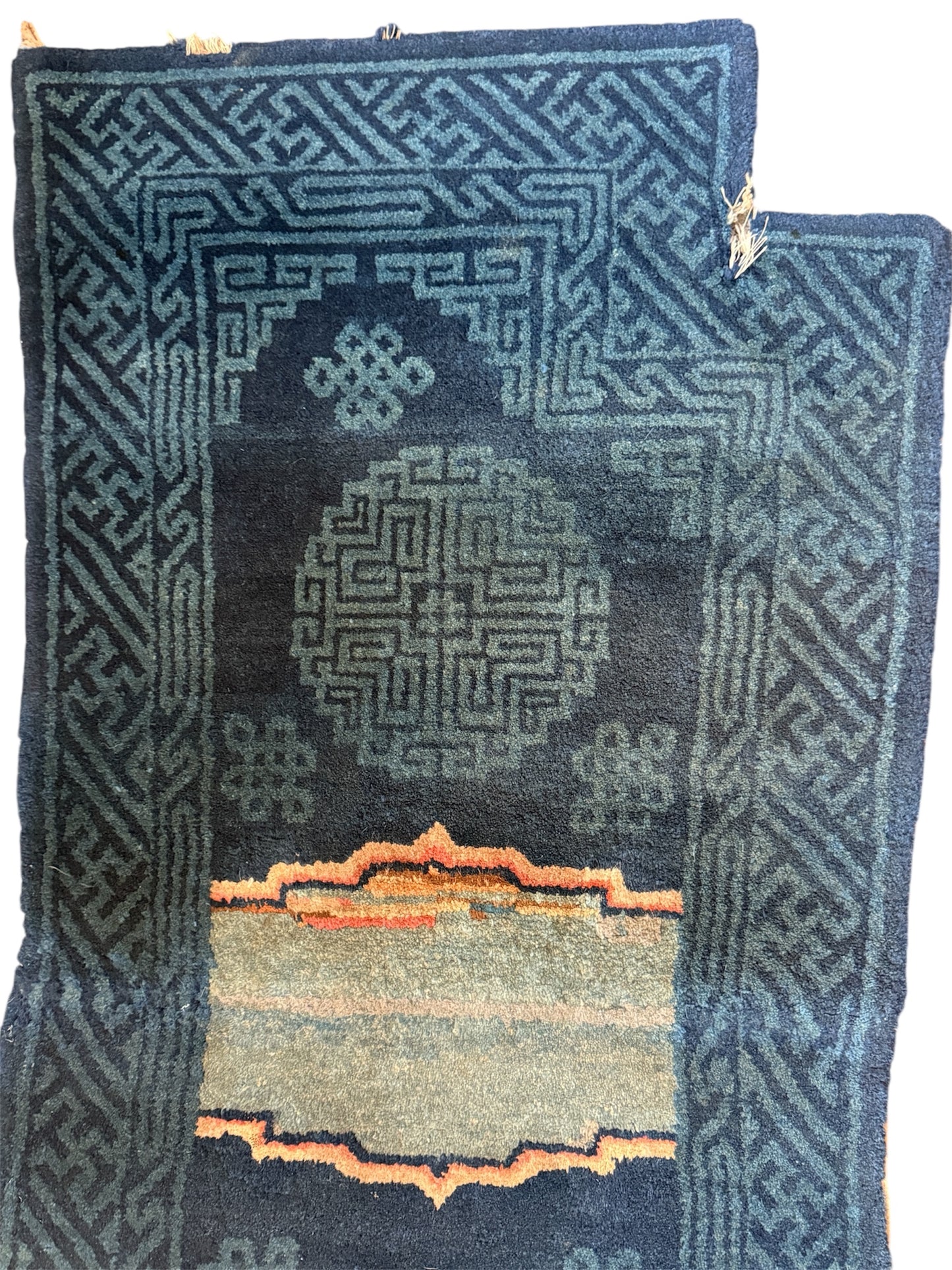 A vintage indigo Tibetan saddle rug