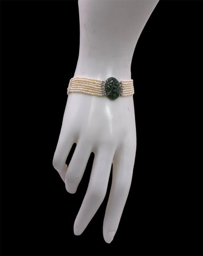 an antique seed pearl and jade plaque bracelet
