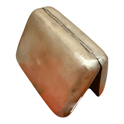 A silver box with hinged lid