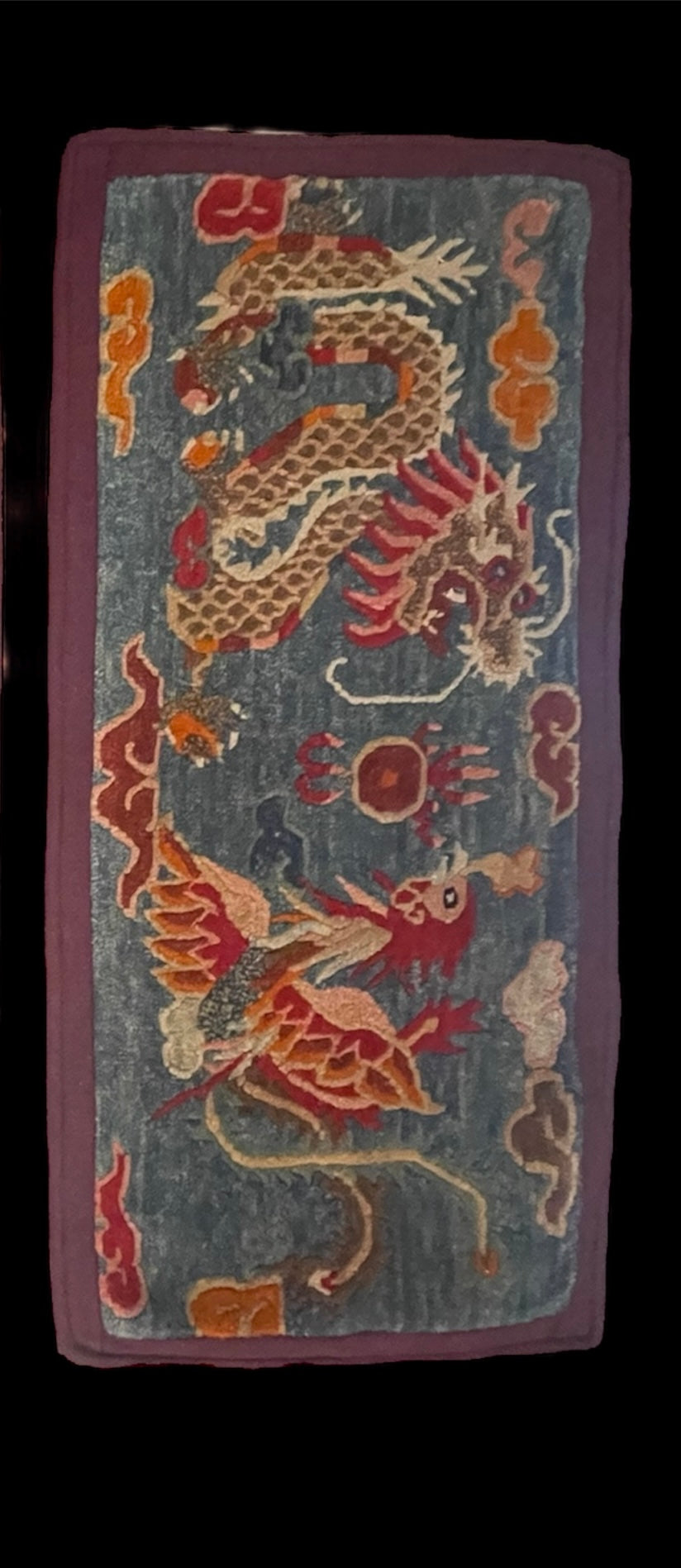 Early 20th C., antique Tibetan dragon and phoenix rugs