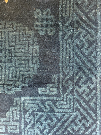 A vintage indigo Tibetan saddle rug