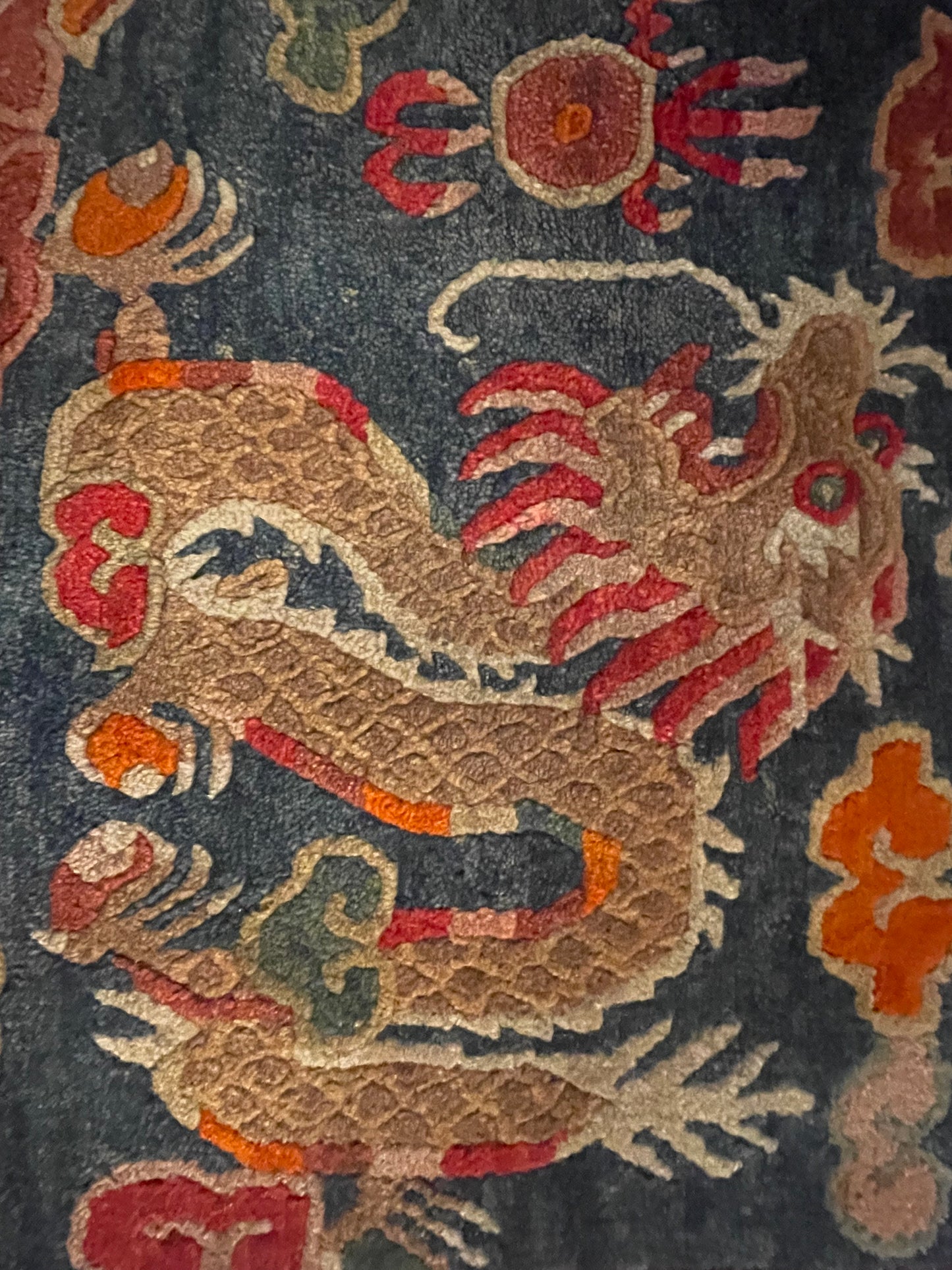 Early 20th C., antique Tibetan dragon and phoenix rugs