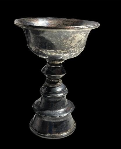 A set of 6 antique Tibetan silver butter lamps