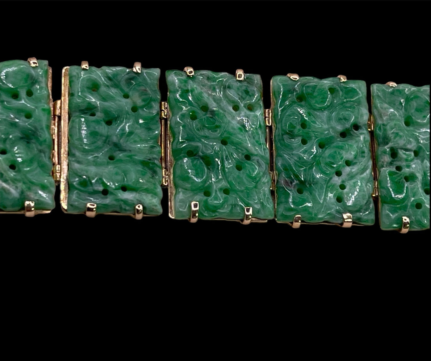 vintage bracelet with jade plaques in a 14kt setting hallmarked  Gumps