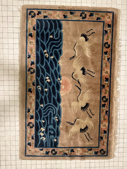 An antique Chinese pictorial rug