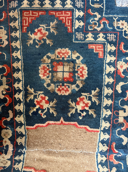A vintage indigo saddle rug